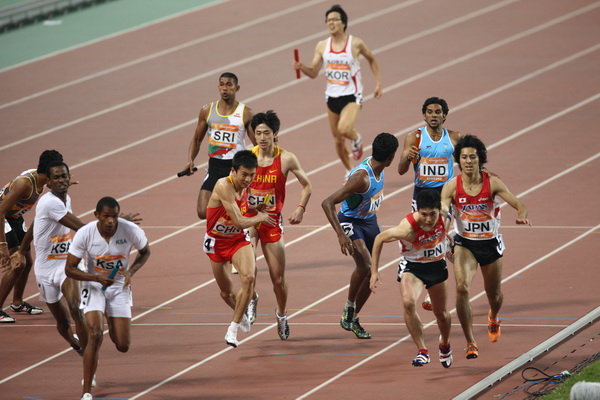 【亚运会--男子4X400米接力决赛摄影图片