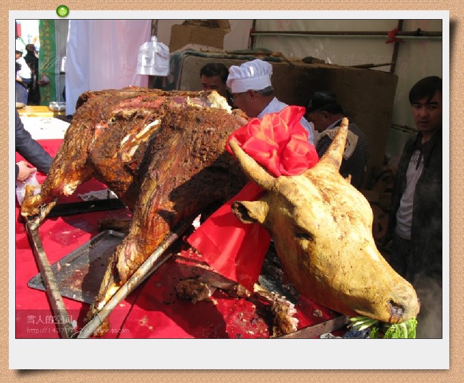 【天下第一吃,烤全牛.摄影图片】新疆 伊宁市纪实摄影