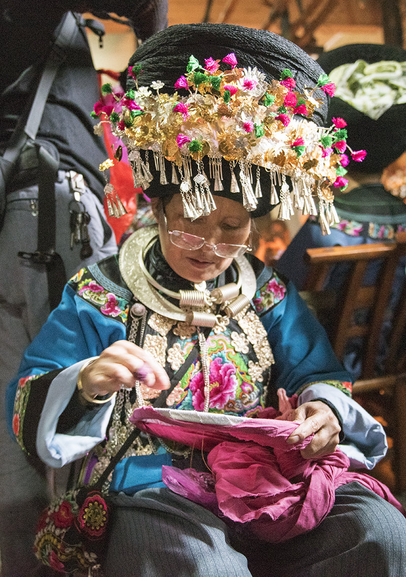 绣娘摄影图片